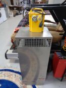 An industrial pro-heat portable heater together with a 110v transformer pack