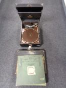 A case HMV table topped gramophone and two cases of 78's