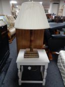 A painted occasional table together with a contemporary table lamp with shade in the form of books