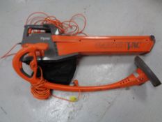 A Flymo garden vacuum together with a strimmer