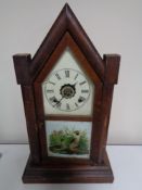 A late 19th century Gothic style eight day mantel clock by the Ansonia clock company