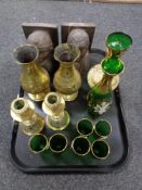 A pair of carved hardwood bookends, Indian brass vases and candlesticks,