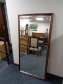 A contemporary bevelled hall mirror