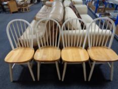 A set of four pine kitchen chairs