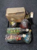 A tray of four ship in bottles, ship under dome,