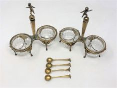 A fine pair of silver gilt nineteenth century French double salts in the Egyptian revival style