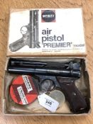 A Webley 'Premier' .22 air pistol, with box and pellets.