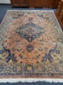 A large Persian design carpet
