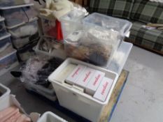 Seven plastic crates of lady's clothes and shoes