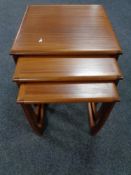 A nest of three twentieth century Sunelm teak tables