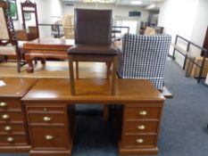 A contemporary dressing table with leather dining chair