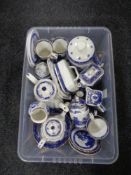 A box of Ringtons willow pattern china, tea services, storage jars,