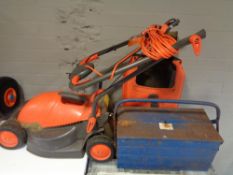 A Flymo mower with lead and grass box together with a concertina metal tool box and tools