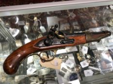 A twentieth century reproduction flintlock pistol (a/f)