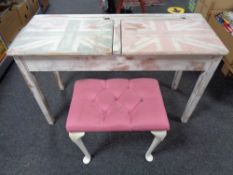 A twentieth century shabby chic double school desk together with a pink stool