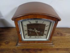 A 1930's mahogany mantel clock