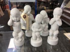 Five Bing and Grondahl baby figures - See no evil, speak no evil, hear no evil and two others.