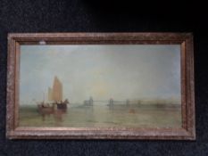 A gilt framed textured print depicting figures in sailing boat with bridges beyond