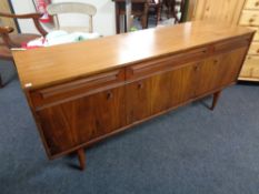 A twentieth century teak cocktail low sideboard