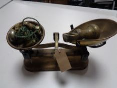 A set of vintage kitchen scales with weights