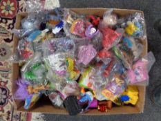 A box of Mcdonalds toys