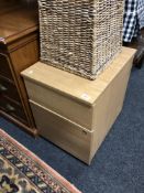 A beech two drawer filing chest