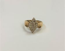 A 9ct gold diamond set ring, size N.