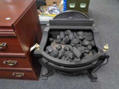 A gallery cast iron electric fire with coals