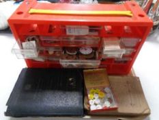 A tray of horologist watch parts and books