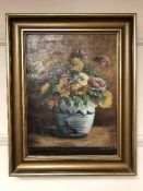 Continental School : Flowers in a vase, oil on canvas, framed.