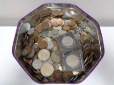 A tin of pre decimal coins and crowns