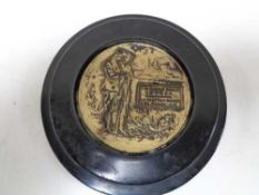 A circular brass commemorative WWI death plaque - Colonel Robert Beech of the Second Scottish Horse