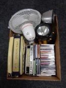 A box of torches, radios, CD's,