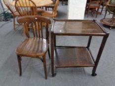 A Bentwood chair together with a twentieth century two tier trolley