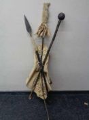 A Zulu style hide shield with spear and club
