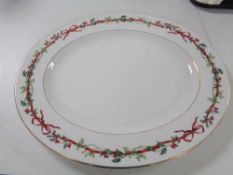 A Royal Worcester Holly ribbons meat plate