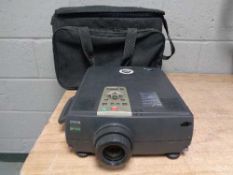 An Epson EMP 7250 projector in carry case