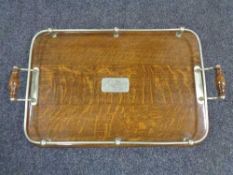 An Edwardian oak and silver plated gallery tray 56 cm x 34 cm.