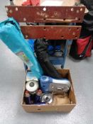 A Black and Decker work mate together with a box of camping light,