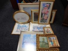 A collection of pictures and prints,