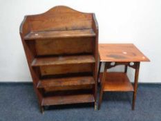 A set of early twentieth century pine bookshelves together with a two-tier Arts and Crafts
