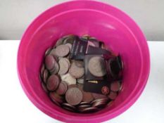 A tub of coins and crowns