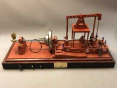 A large model Walking Beam Marine Engine 1904, on plinth under glass cover,