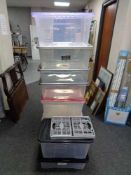 A quantity of plastic storage boxes with lids