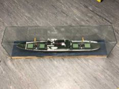 A large model ship behind glass, length 123cm.