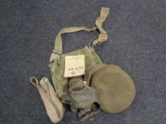 A box of WWII army cap, ration book,