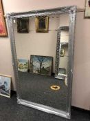 A 5' x 3' chrome framed mirror