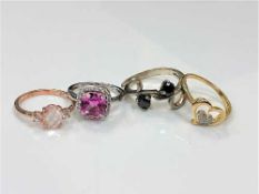 Four sterling silver dress rings (4)