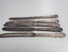 Five silver handled butter knives