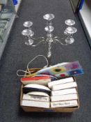 A large metal five way candelabrum together with a box of wall light,